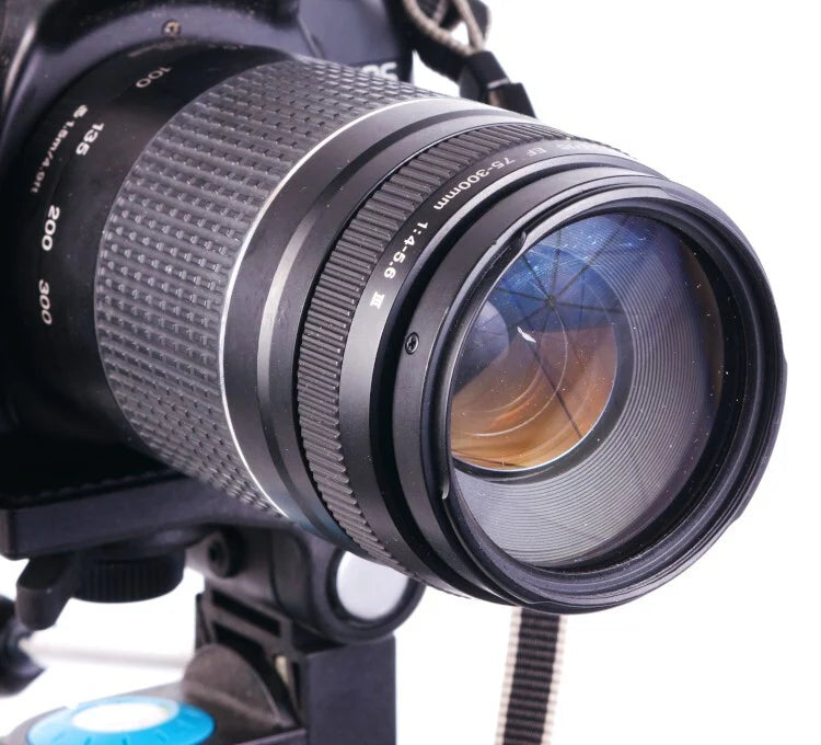 CANON 750 W/ 75-300MM LENS & TRIPOD