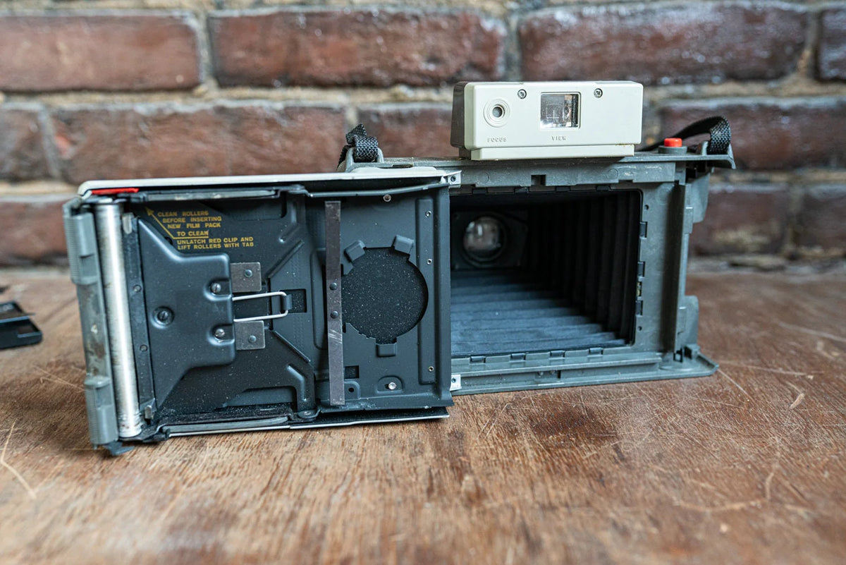 Polaroid Automatic Land Camera Model 320 w/ Manual - Sold AS IS