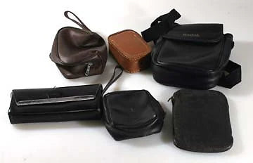 MISCELLANEOUS LOT OF LENS AND CAMERA CASES (6)