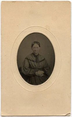 CIVIL WAR ERA OVAL OLDER LADY WITH NICE DRESS TINTYPE