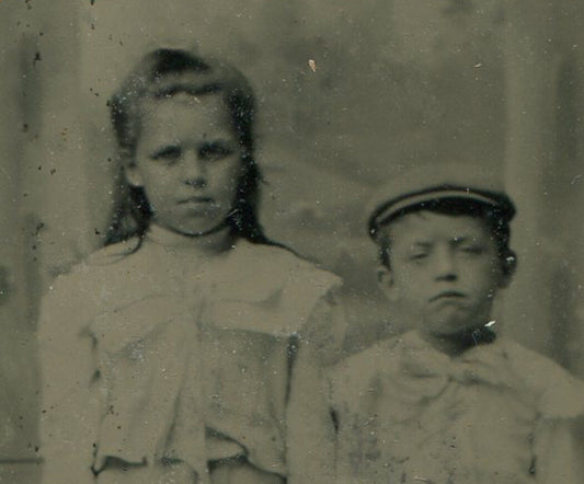 YOUNG SIBLINGS, TIRED OF BEING SMALL. PAINTED BACKGROUND, TINTYPE, PERIOD MAT.