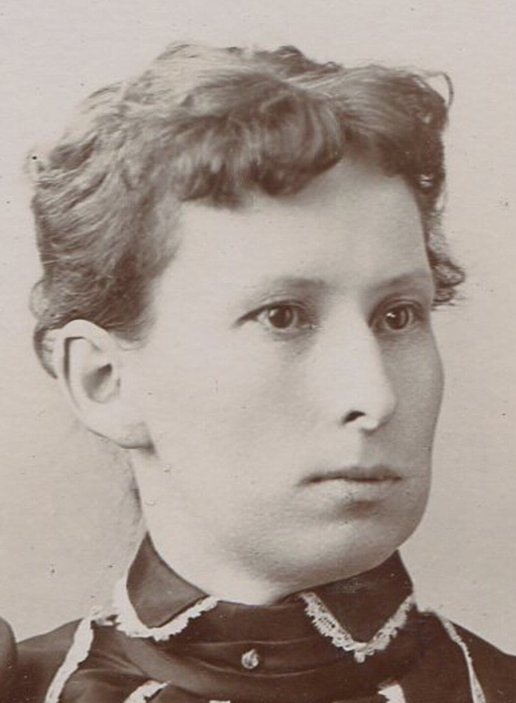 VERY LONG FACED WOMAN IN VERTICAL STRIPED DRESS. CABINET CARD. PORTLAND, ME.