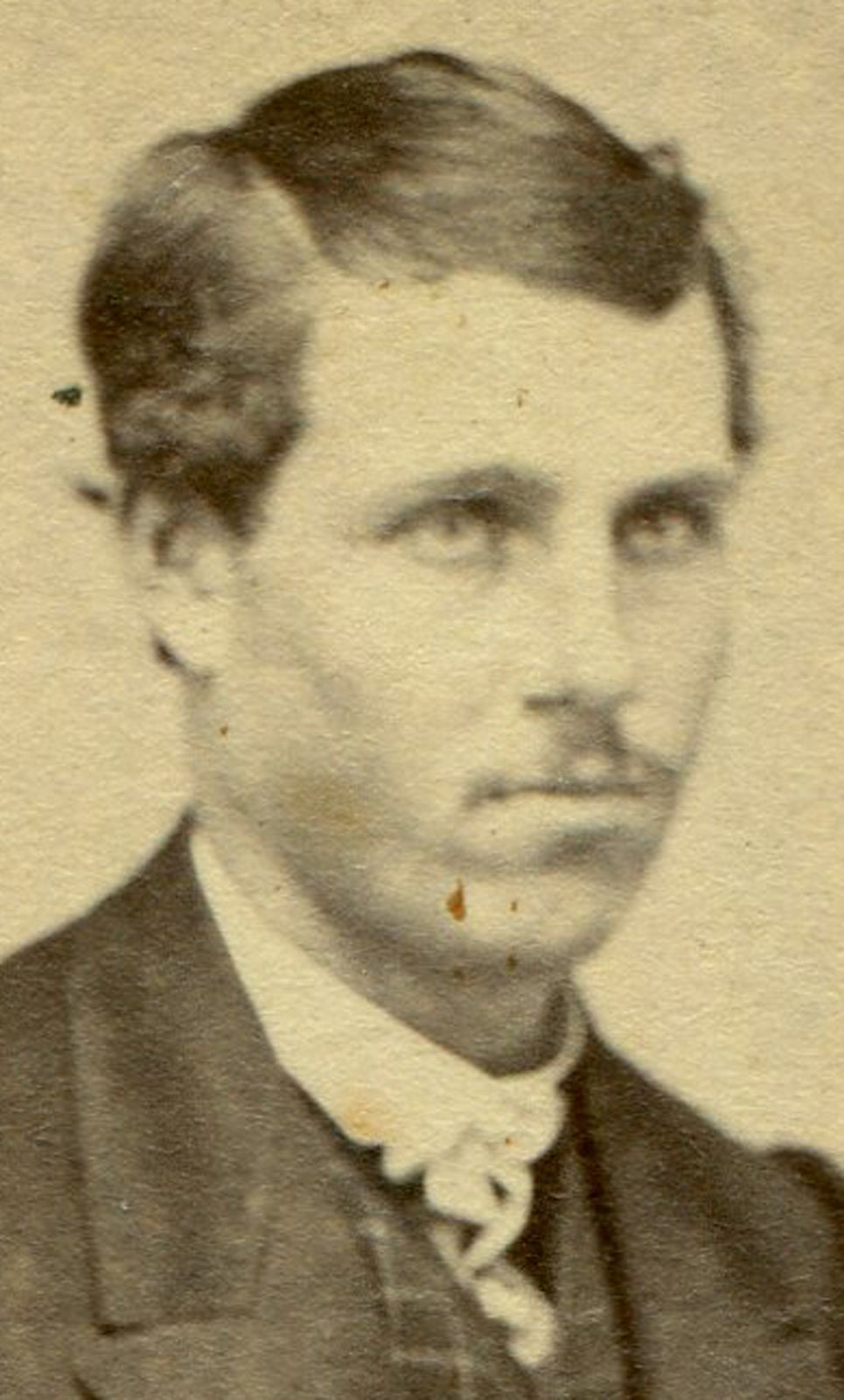 MAN IN LOOSE SUIT, SLICK HAIR, SEATED ON POSING CHAIR. CDV.