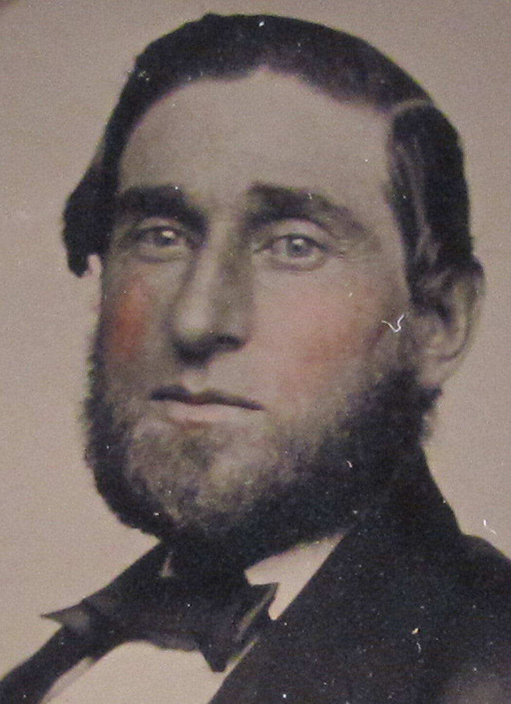 LONG FACE MAN, CHIN BEARD. TINTED AMBROTYPE, 6TH PLATE HALF CASE.