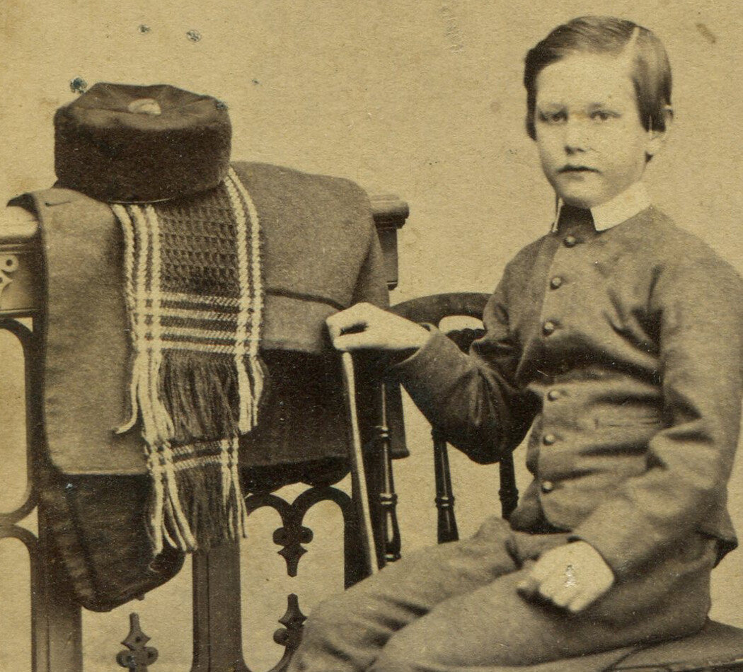 YOUNG BOY POSED NEXT TO FOLDED COAT, SCARF, HAT. CDV. HARTFORD, CONN.