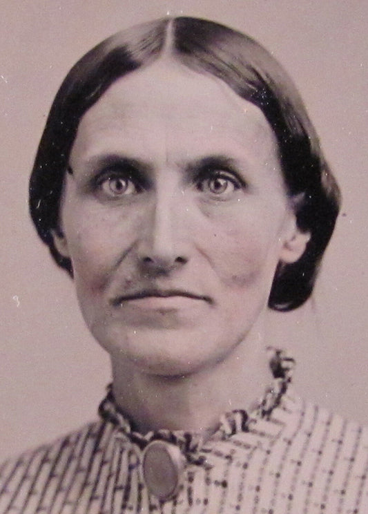 WOMAN, HIGH CHEEKBONES. TINTED 6TH PLATE TINTYPE, GLASS AND FOIL.