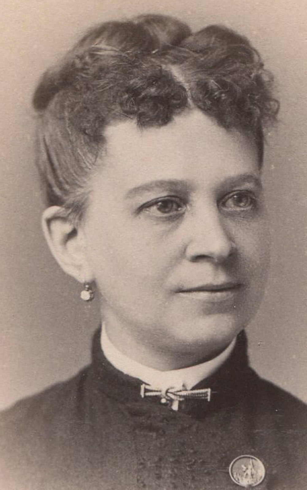 WOMAN, TIGHT CURLS, EARRINGS. CABINET CARD BY FREDRICKS, N.Y.