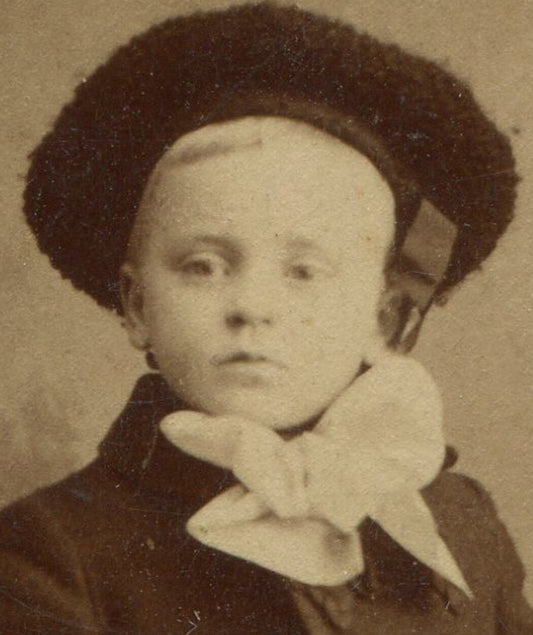 YOUNG BOY IN WINTER WEAR, RELAXED POSE. CDV.  N.Y.C.