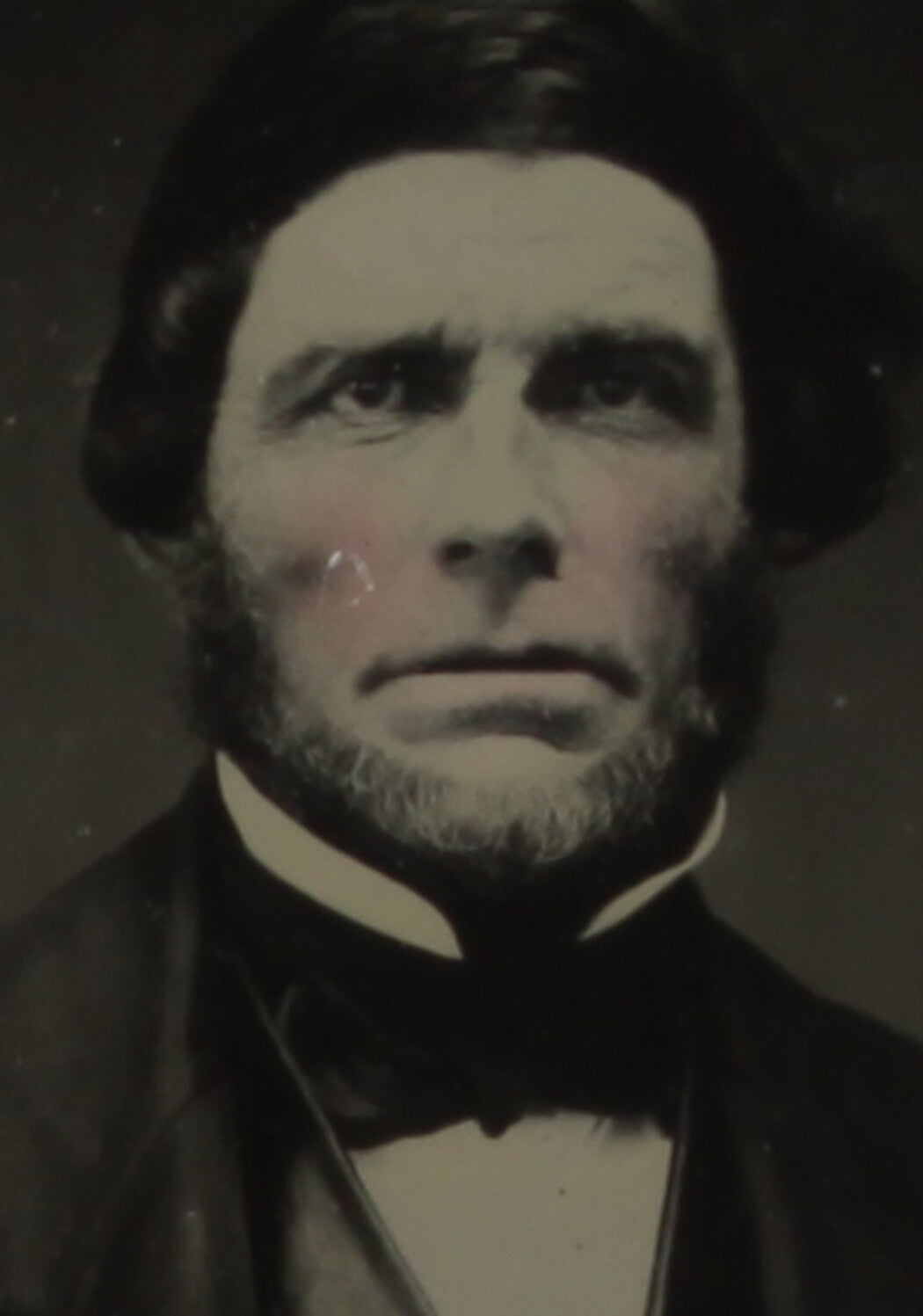 RUGGEDLY HANDSOME MAN. CRISP TINTED 6TH PLATE AMBROTYPE, FULL CASE.