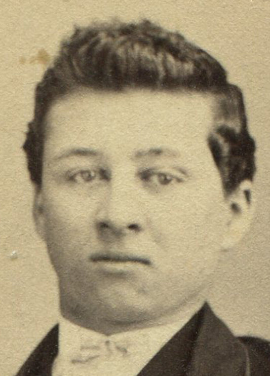 YOUNG MAN, CONSTIPATED EXPRESSION, STIFFLY POSED. CDV. MAUCH CHUNK, PA.