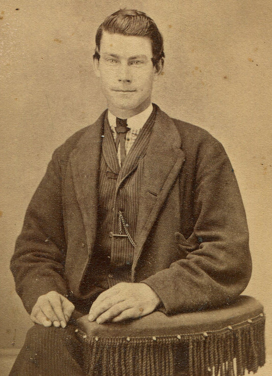 CUTE YOUNG MAN WITH IMPISH GRIN. CDV. MUSKEGON, MICHIGAN.