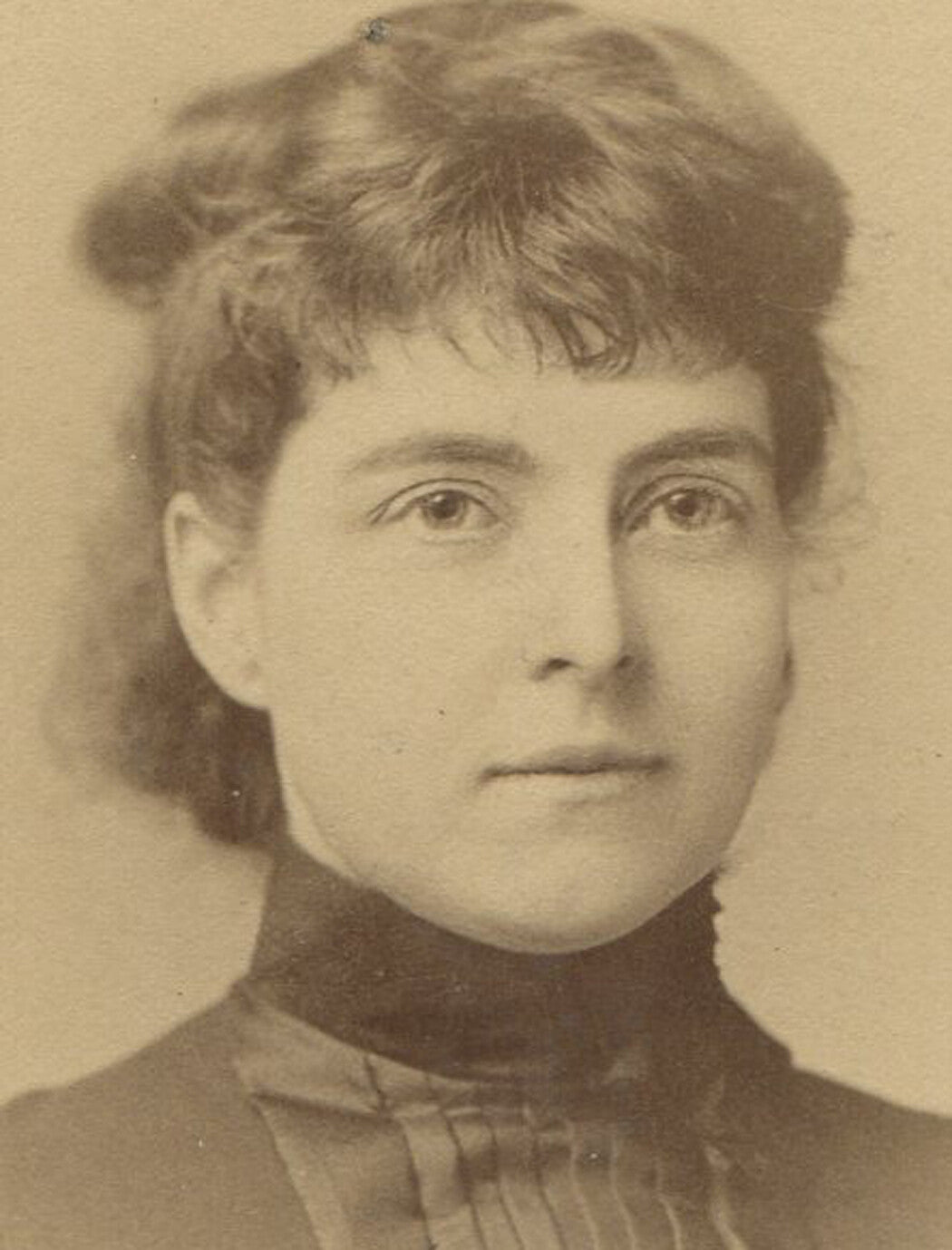 Vintage cabinet card portrait: Woman with messy hair, contemplative gaze, NY, early 20th century original photo