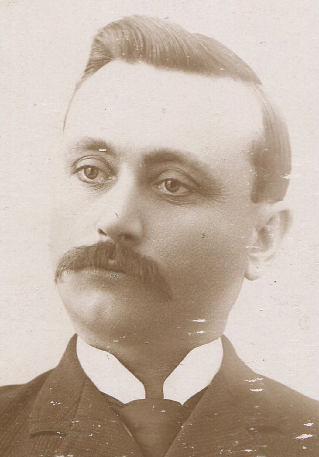 BORED IOWA MAN WITH MUSTACHE. CABINET CARD. PARKERSBURG, IOWA.