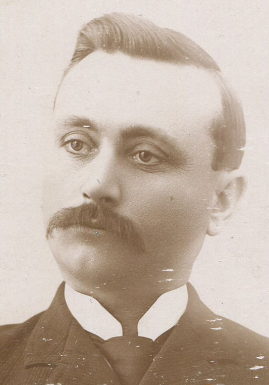 BORED IOWA MAN WITH MUSTACHE. CABINET CARD. PARKERSBURG, IOWA.