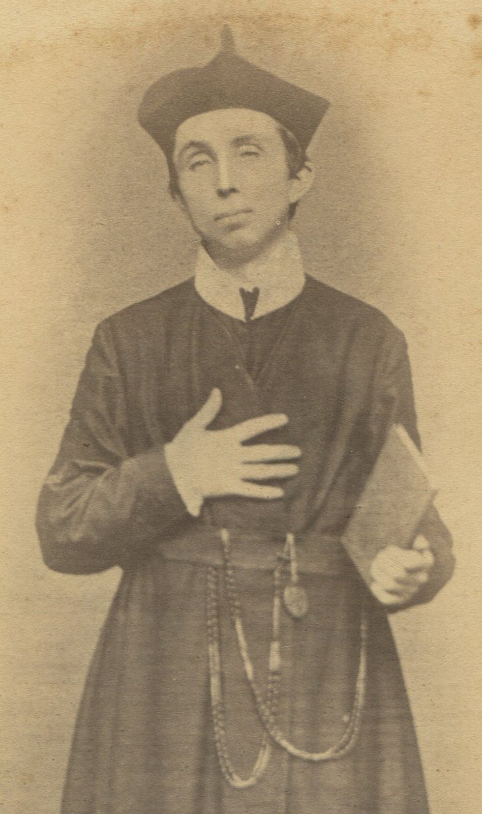 PRIEST CLUTCHING CHEST, OMG. TONED SILVER PRINT. 1900-1930.