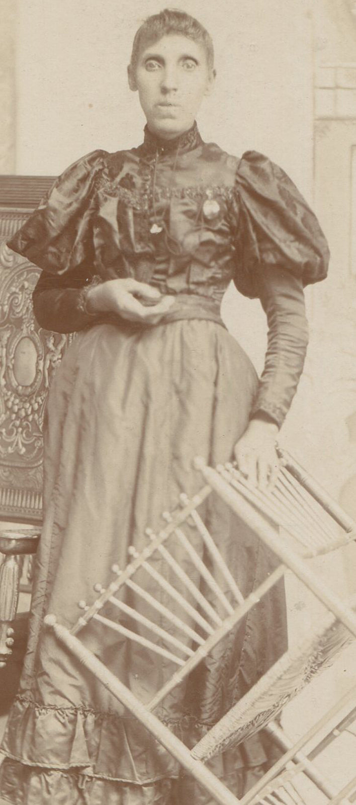 WOMAN READY TO TOSS A CHAIR. CABINET CARD. COLUMBUS, OHIO.
