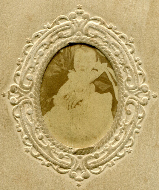 BABY W/HIDDEN MOTHER. UNMOUNTED ALBUMEN IN PERIOD PAPER MAT.