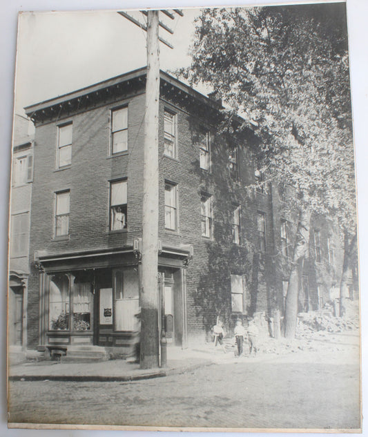 ARCHITECTURAL EXTERIOR, CORNER STORE, CHILDREN PLAYING. 16 X 20  SILVER PRINTS.