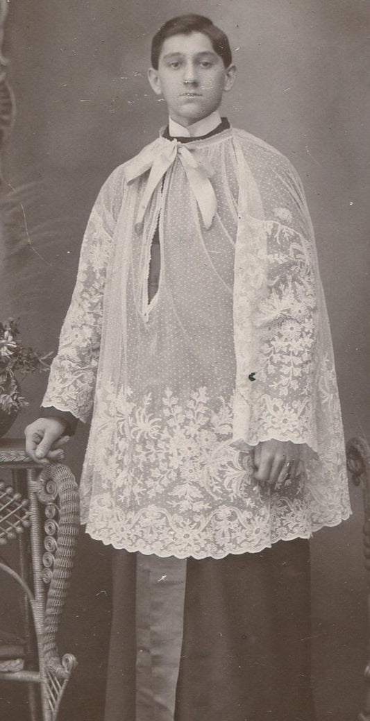 ALTER BOY IN REGALIA. STANDING POSE, SERIOUS EXPRESSION. CABINET CARD.