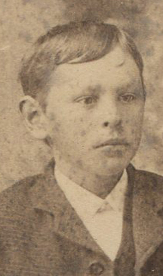 YOUNG MAN, RELAXED POSE, HAT IN HAND. CABINET CARD. WINFIELD, IOWA.