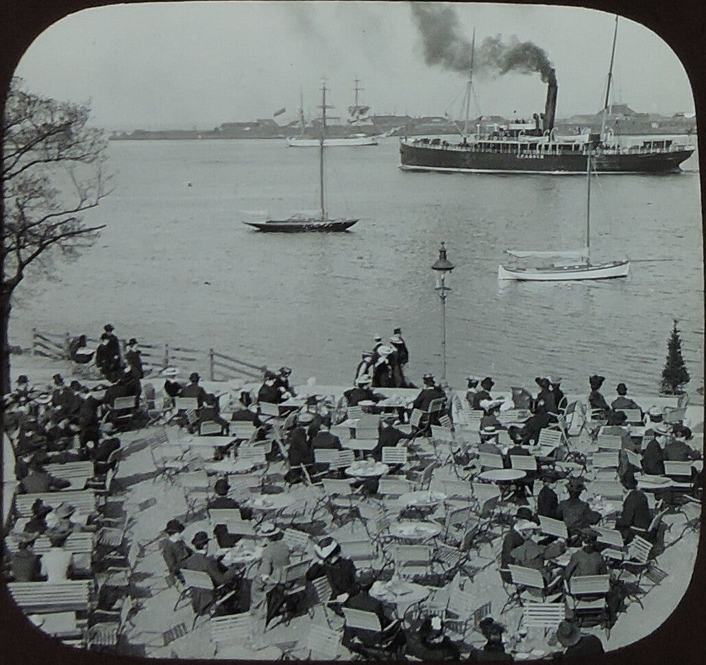 PEOPLE SITTING AT TABLES + BUSY HARBOR W/ CPA KOCH SHIP, ANTIQUE PHOTO ON GLASS