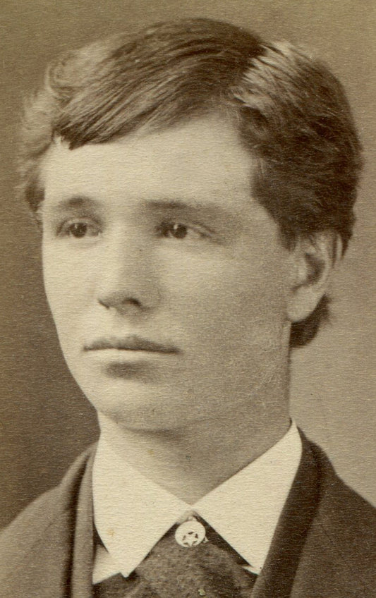 YOUNG MAN, SAD FACE, BROAD LAPEL. CDV. CARTHAGE, ILL.