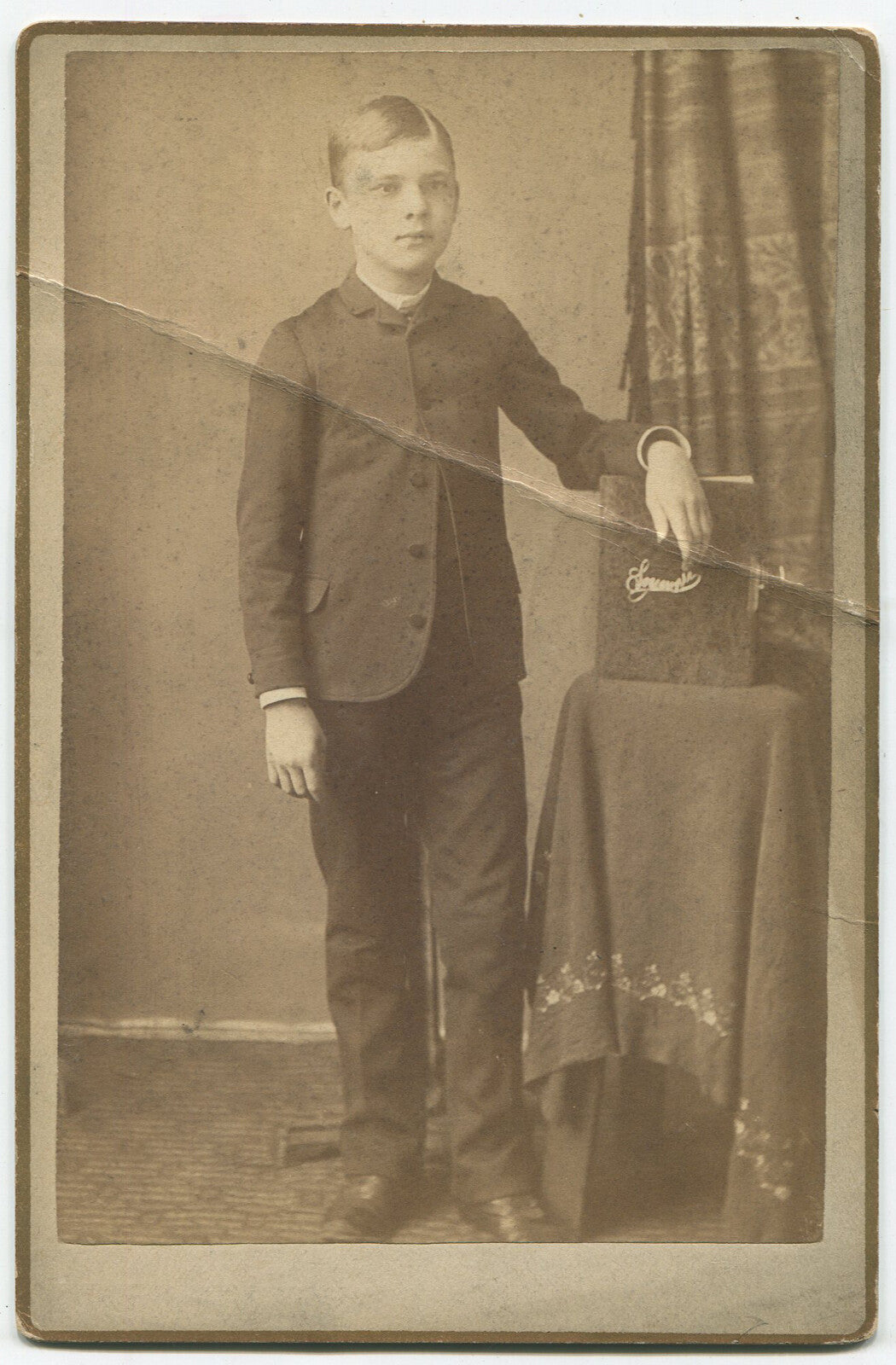 BOY POSED, STANDING W/ FOREARM RESTING ON BOOK. CABINET CARD. ELMHURST, ILL.