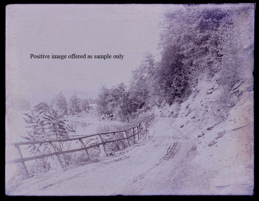 COUNTRY LANE WITH FENCE NEXT TO POND. GLASS PLATE NEGATIVE, 6.5 X 8.5 INCHES.
