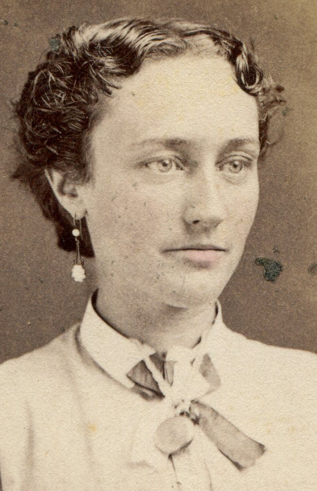 WOMAN WITH SHORT TOUSLED HAIR, LONG EARRINGS. CDV, FORT EDWARD, N.Y.