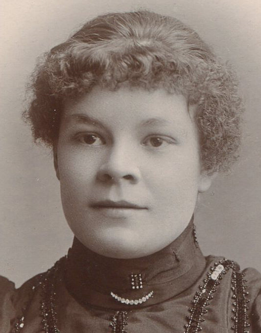 WOMAN IN BEADED, SEQUIN TRIMMED DRESS. CABINET CARD. ENGLAND.