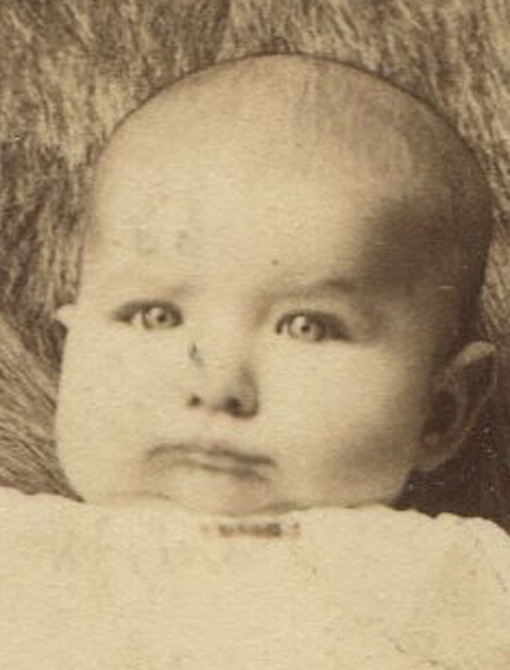 BABY PERCHED ON FUR DRAPED CHAIR. CABINET CARD. LATROBE, PA.