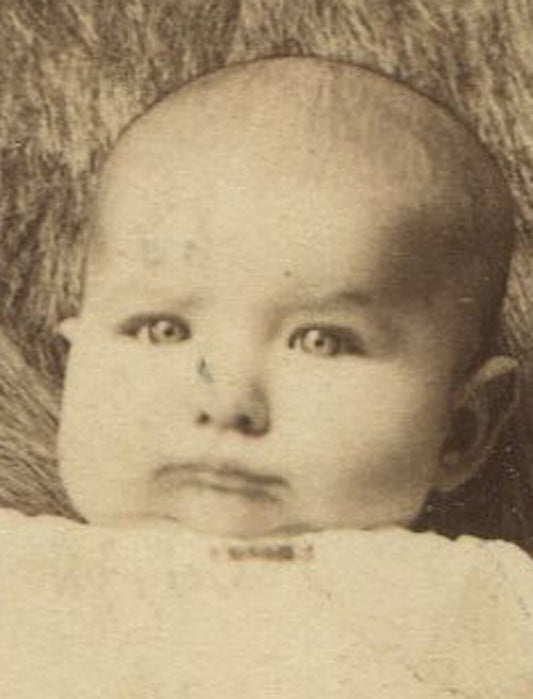 BABY PERCHED ON FUR DRAPED CHAIR. CABINET CARD. LATROBE, PA.