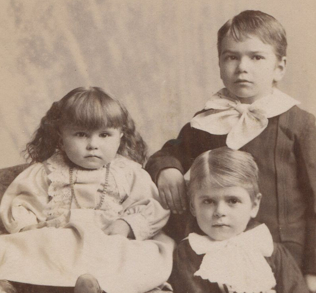 THREE GRIM FACED SIBLINGS PLOTTING SOMETHING BAD. CABINET CARD. LIMA, OHIO.