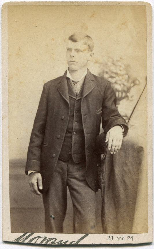 MAN, RELAXED POSE, OPEN COAT. CDV.