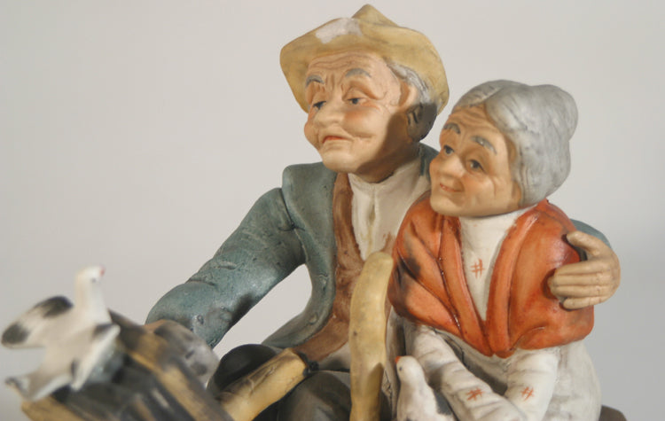 EDLERLY COUPLE WATCH THE BIRDIE PORCELINE FIGURE
