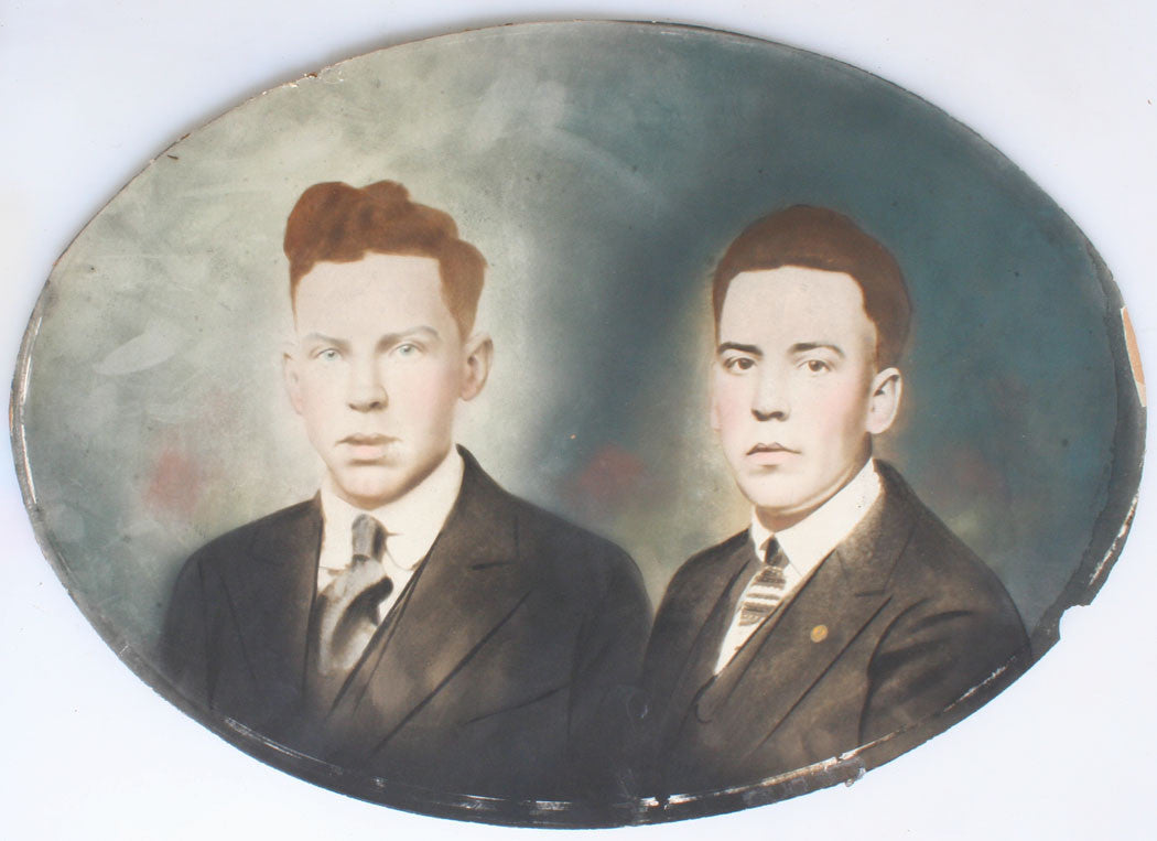 BROTHERS IN SUITS. HAND COLORED PORTRAIT. OVAL, 19.5 X 13.75 INCHES.