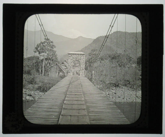 BRIDGE OVER RIO TULUMAYO. SAN RAMON, PERU.