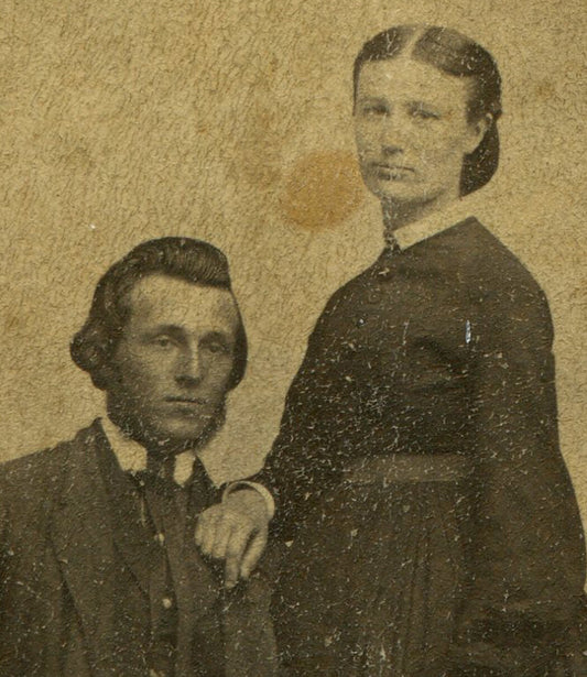 COUPLE IN CLASSIC POSE, STOIC. EARLY CDV. CLEVELAND, OHIO.