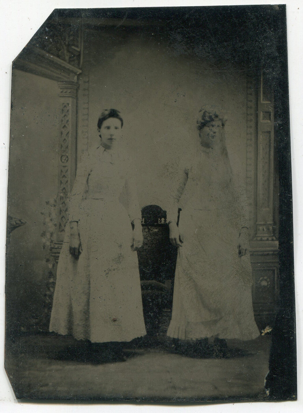 TWO WOMEN, FULL LENGTH STANDING POSE. TINTYPE.