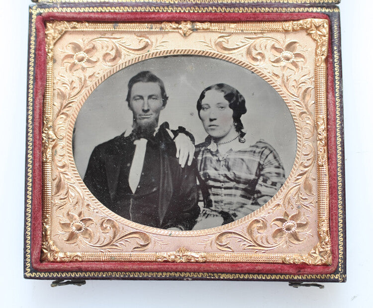 CASED TINTYPE PORTRAIT OF YOUNG COUPLE W/ SMIRKING MAN