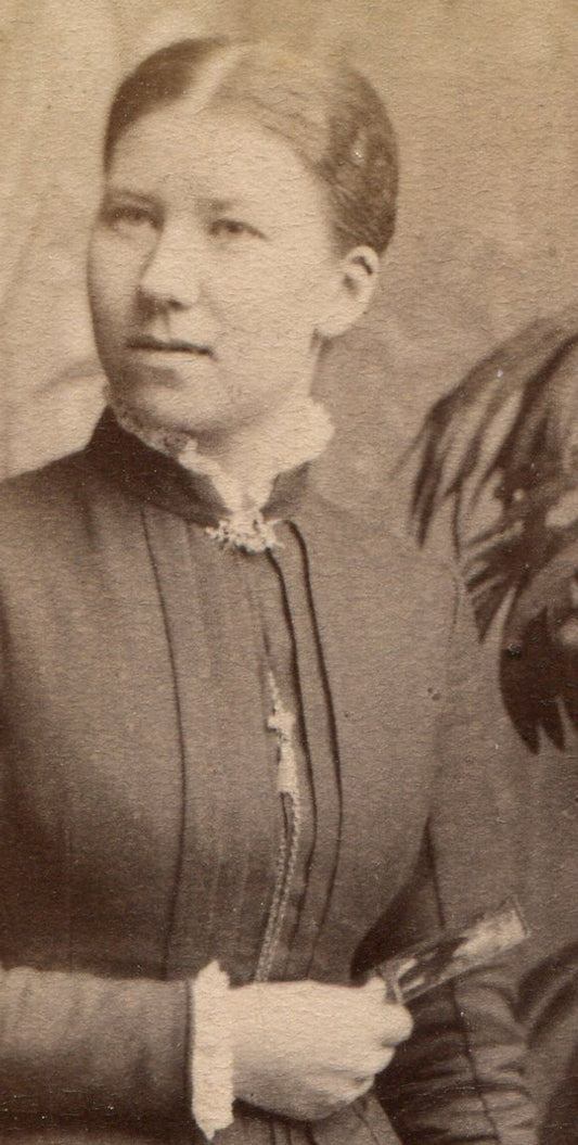 WOMAN, MYSTERY SMILE, HOLDING MYSTERY OBJECT. CDV. STOCKHOLM, SWEDEN.