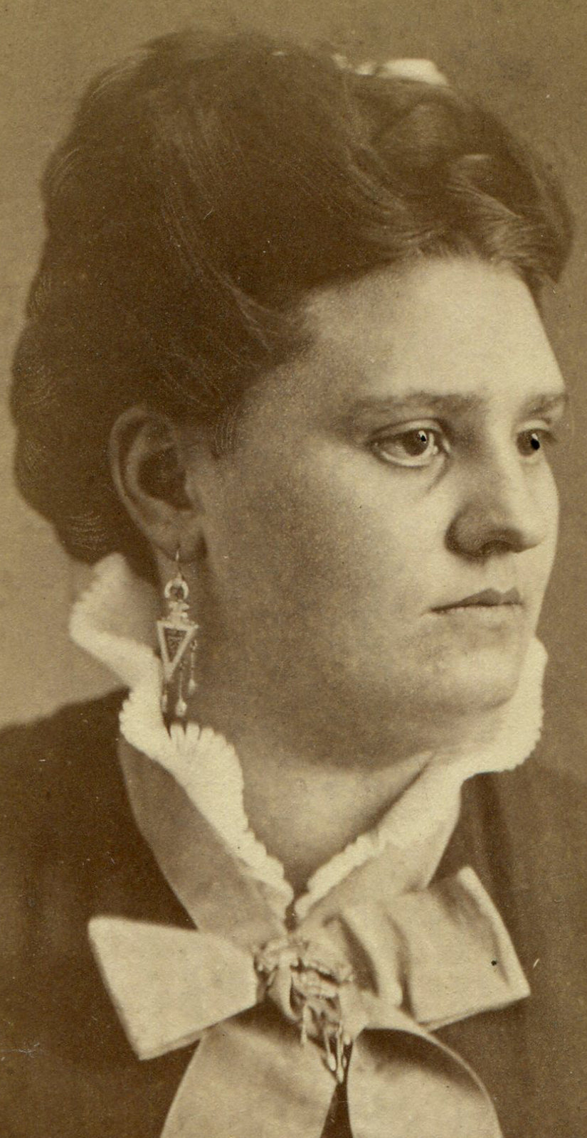 WOMAN, PROFILE POSE, LONG EARRINGS, HIGH COLLAR. DRAMATIC. CDV. FRAMINGTON, ILL.