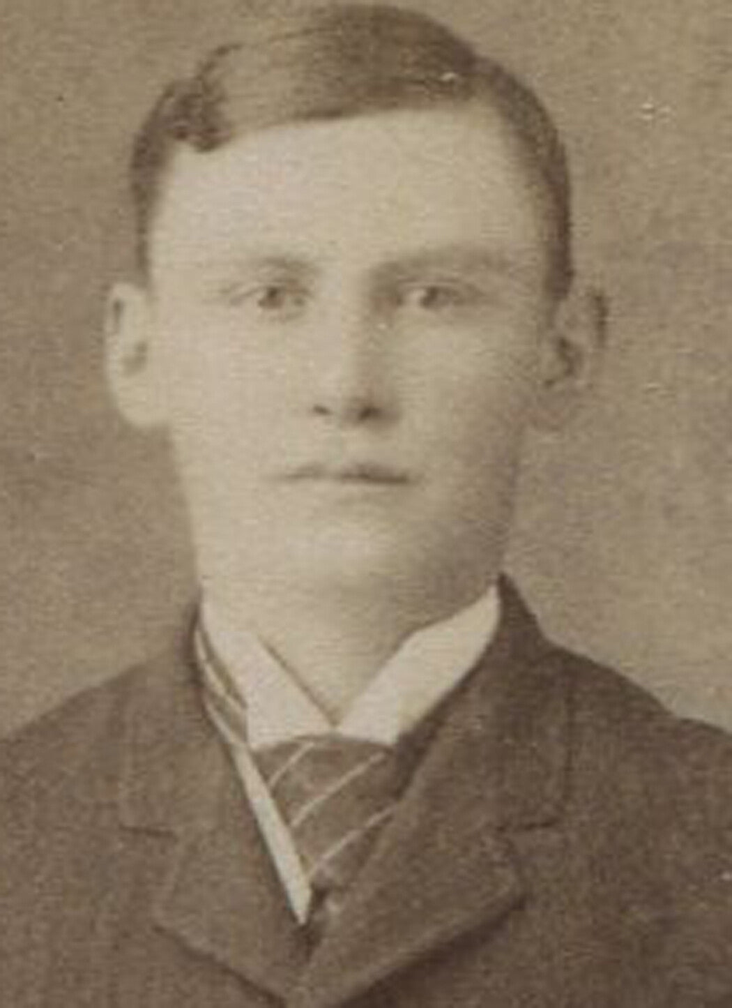 YOUNG MAN CORNERED BY DOMESTIC LIFE. CABINET CARD/ PAINTED BACKGROUND.