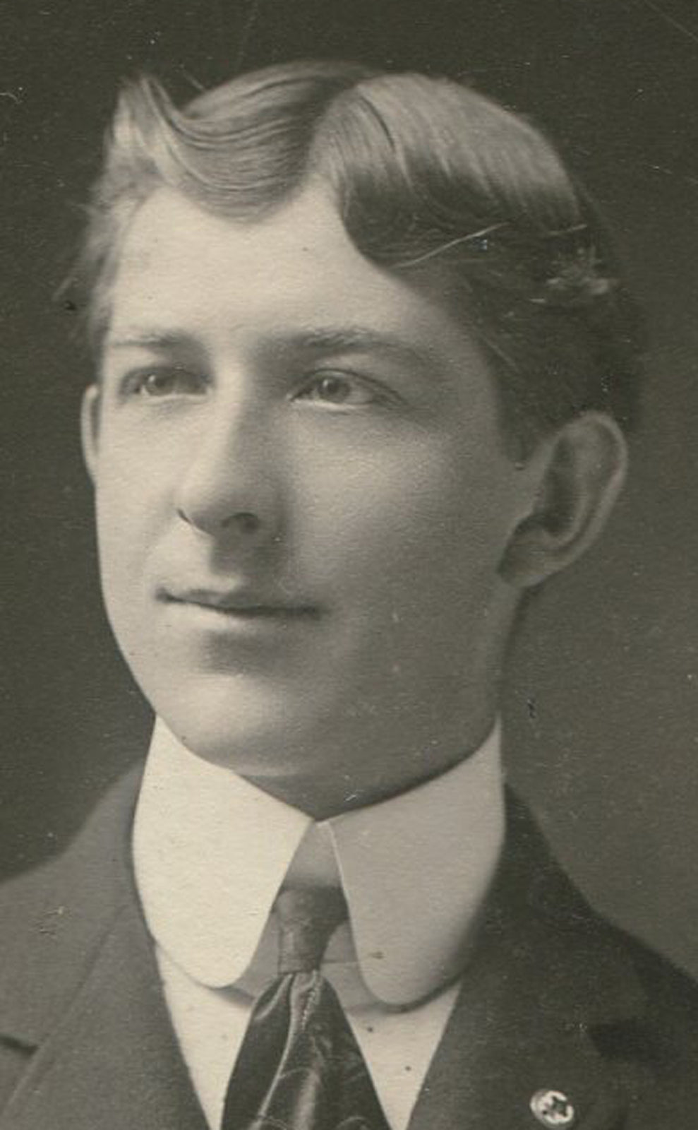 YOUNG MAN WITH COCKEYED LOOK ABOUT HIM. SILVER PRINT CIRCA 1890.
