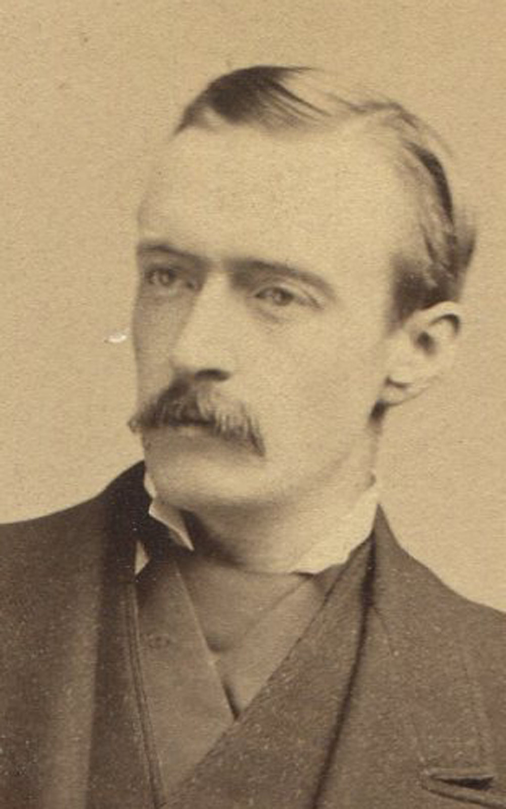 VERY HANDSOME MAN HOLDING HAT. TACK SHARP ALBUMEN IN MAT.