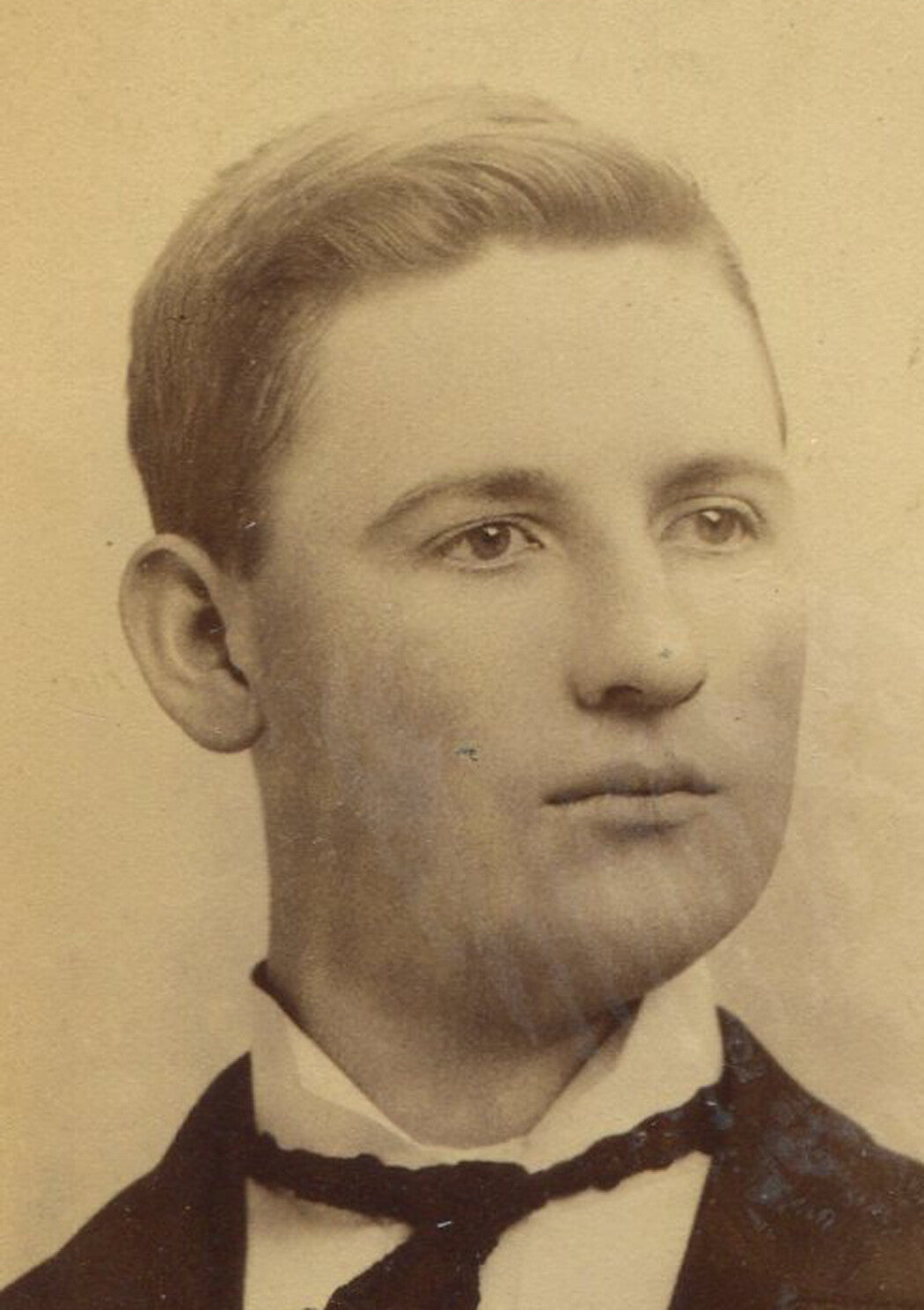 YOUNG MAN WITH NECK TIE ASKEW. CABINET CARD. DIXON, ILL.