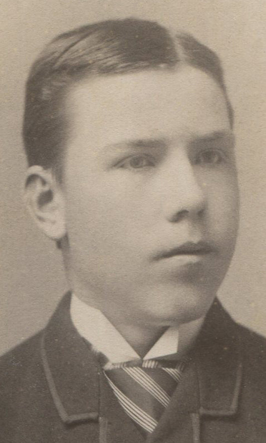 THICK FACED YOUNG MAN, SLICK HAIR AND STRIPED TIE. CABINET CARD. WATERBURY, CONN