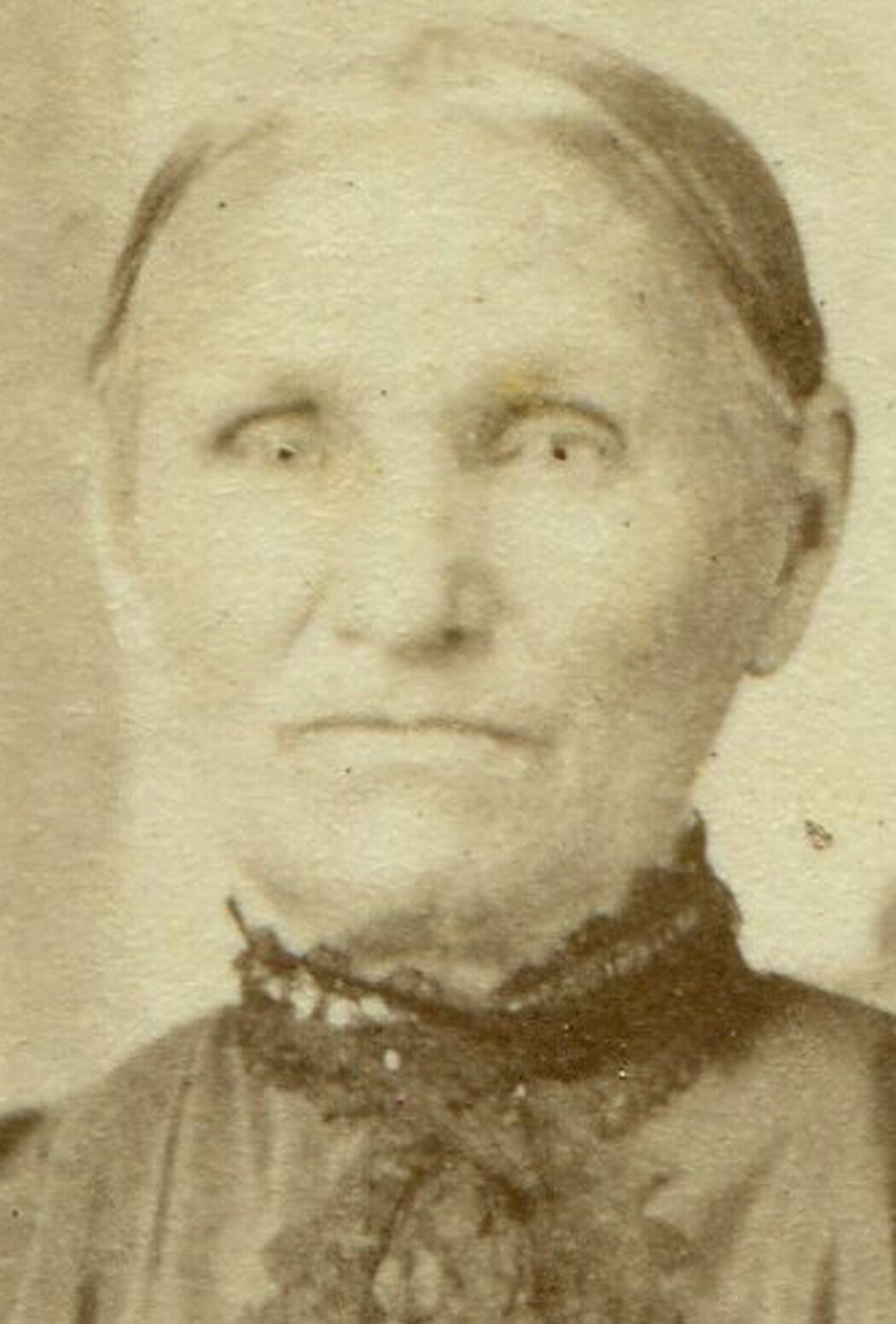 OLD WOMAN, STIFFLY POSED, STARTLED EXPRESSION. CDV. BELLEVILLE, ILL.