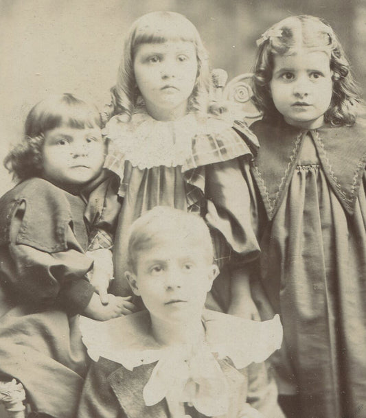 YOUNG BOY OVERWHELMED BY 3 SISTERS. CABINET CARD. SPRINGFIELD, ILL.