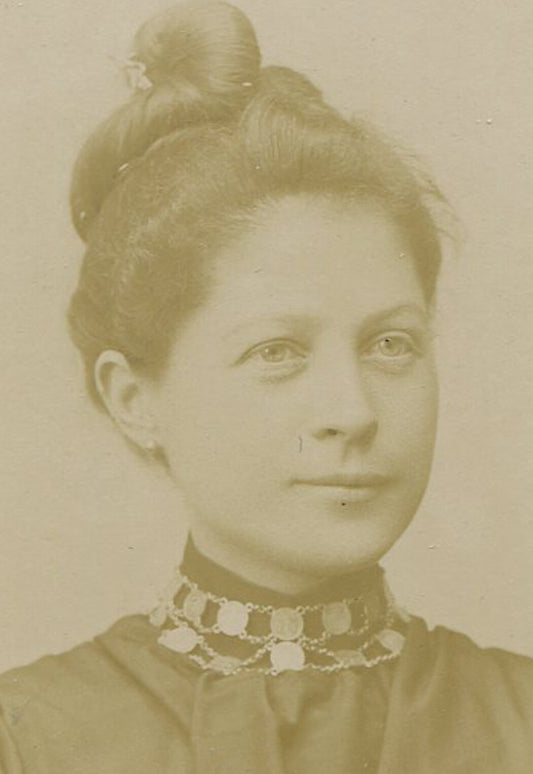 WOMAN WITH WIGGLY FRENCH TWIST HAIR STYLE. CABINET CARD, HUNTINGDON, PA.